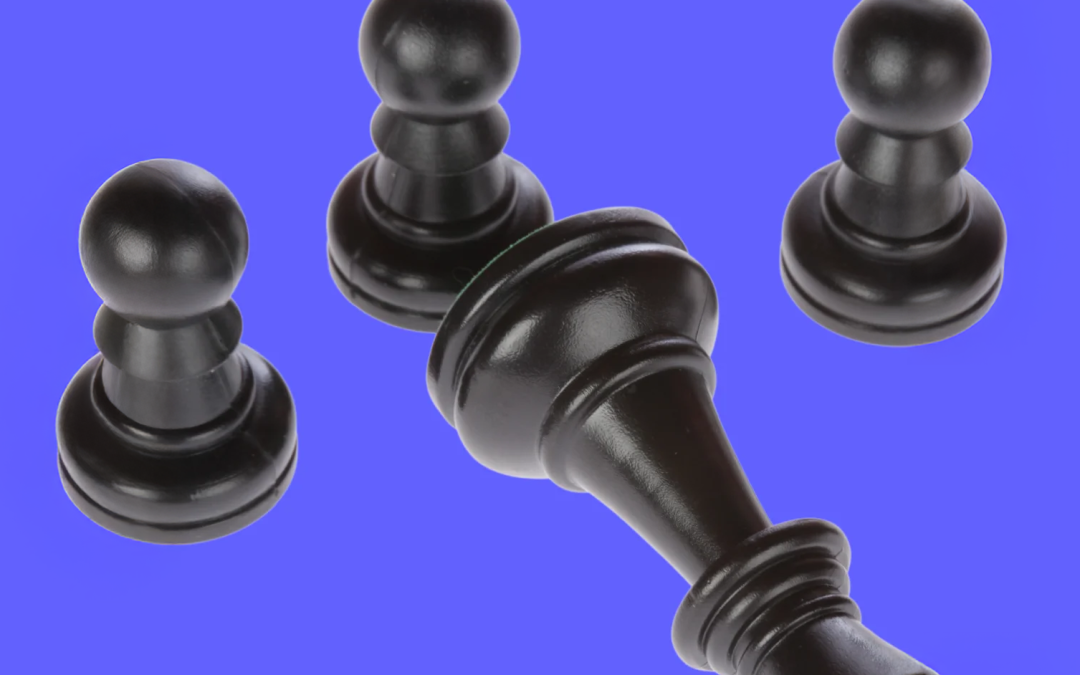 black chess pieces on purple background