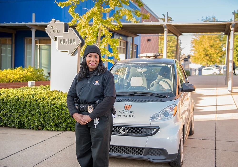 ClarionStoryshot Clarion security guard in front of Clarion branded vehicle