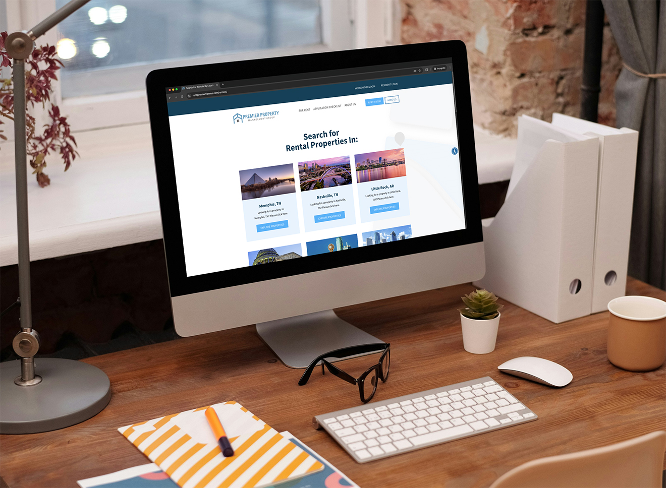premier property rental property locations page on mac desktop in office