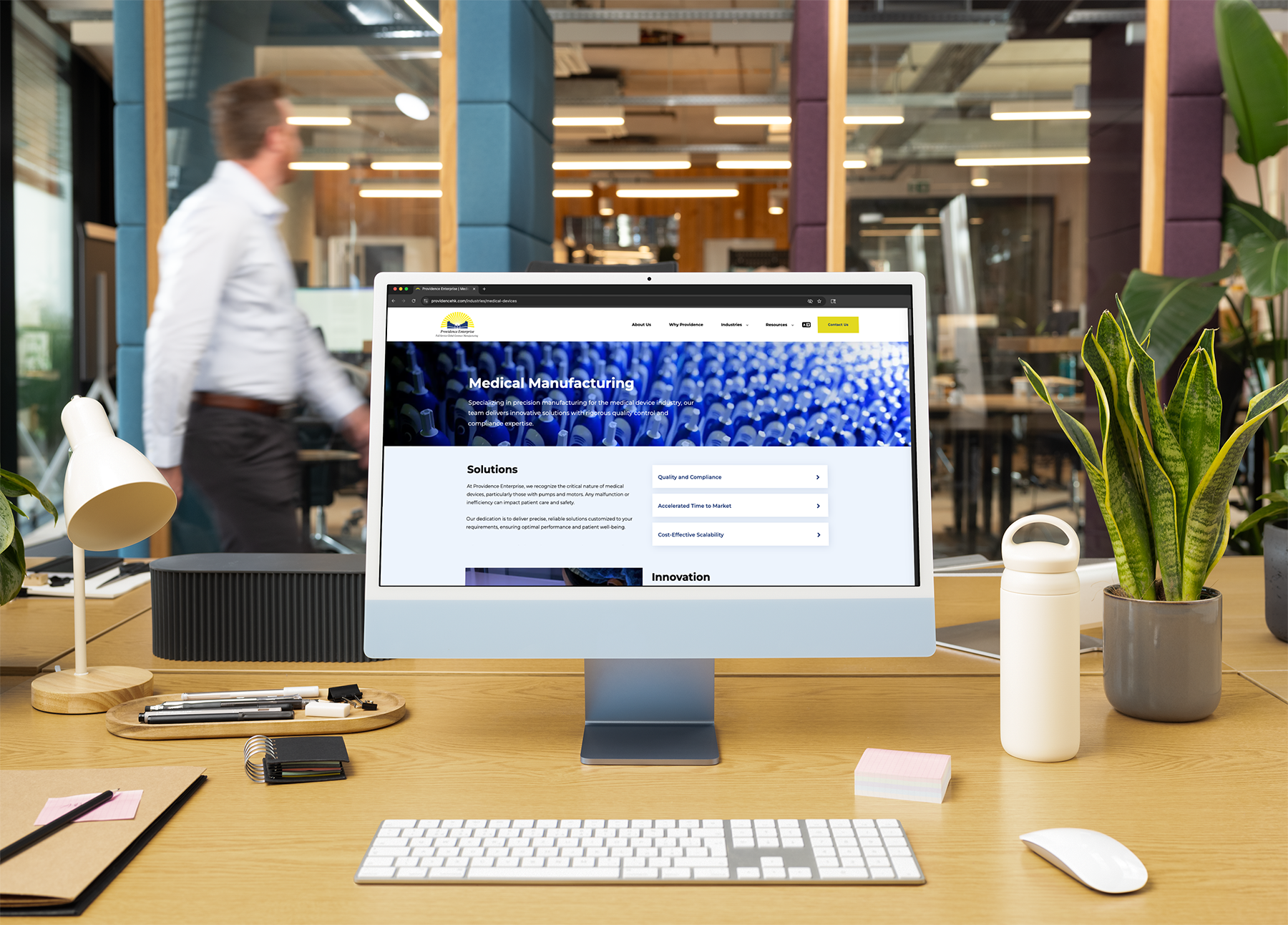 providence website medical device manufacturing page on desktop in office