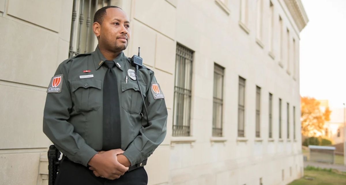 clarion security guard outside government building