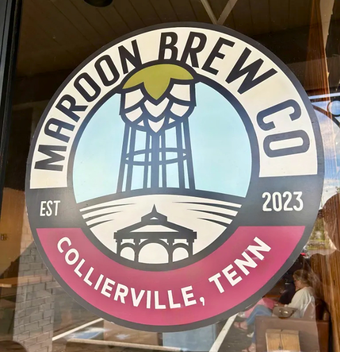 maroon brew co door with emblem