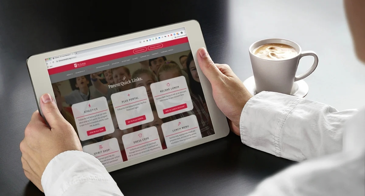 St. Louis Catholic School website on tablet